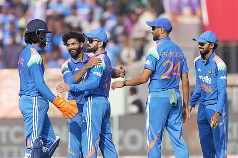 India's Ravindra Jadeja, second from left, celebrates with teammates the wicket of South Africa's captain Temba Bavuma during the third One Day International cricket match between India and South Africa in Visakhapatnam.