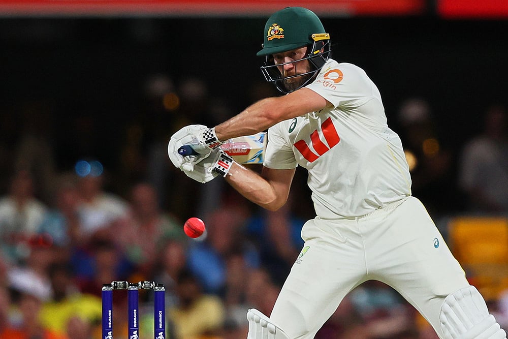 Australia's Michael Neser plays a shot during the second Ashes cricket test match between Australia and England in Brisbane. - | Photo: AP/Tertius Pickard