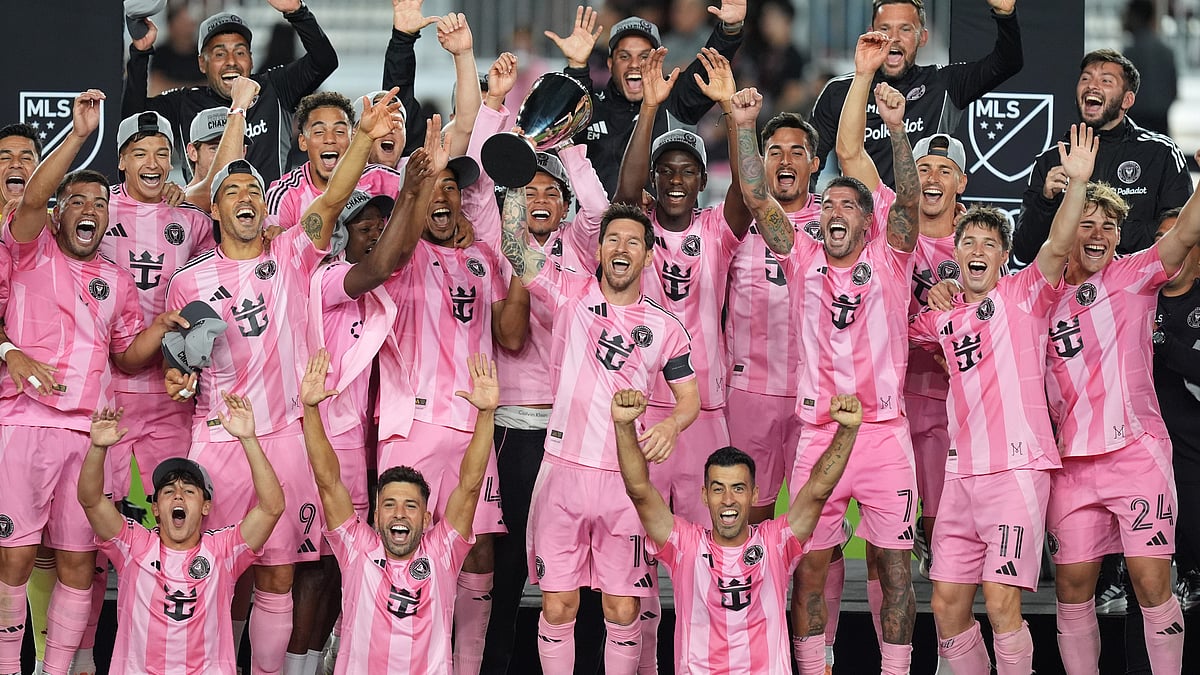Inter Miami forward Lionel Messi lifts the trophy as Inter Miami players celebrate winning an MLS Eastern Conference final match against New York City FC on November 29, 2025. - | Photo: AP/Rebecca Blackwell