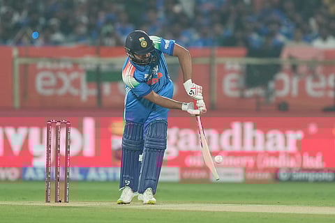 India's Rohit Sharma plays a shot during the third One Day International cricket match between India and South Africa in Visakhapatnam.