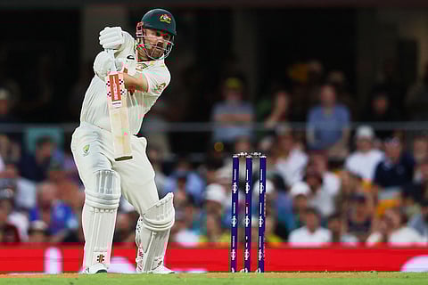 Australia's Travis Head plays a shot during the second Ashes cricket test match between Australia and England in Brisbane.