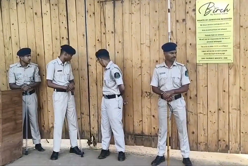  Police personnel keep vigil at the site after a fire broke out at a nightclub due to a cylinder blast, in North Goa. At least 23 people were killed in the incident, according to officials.  - Photo: PTI