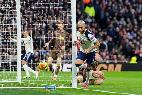Tottenham Hotspur's Richarlison scores their side's first goal during the English Premier League soccer match between Tottenham Hotspur and Brentford in London.