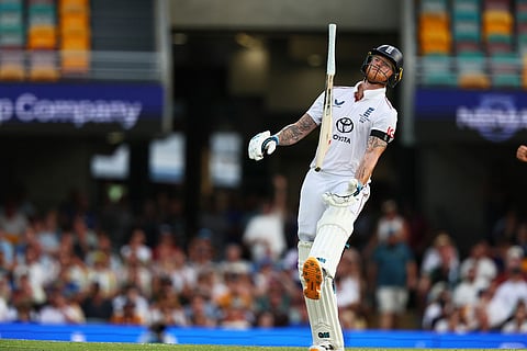 England's captain Ben Stokes throws bat after loosing his wicket during the second Ashes cricket test match between Australia and England in Brisbane.