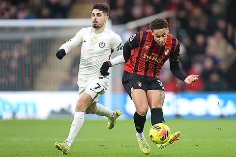 Bournemouth's Marcus Tavernier, right, and Chelsea's Pedro Neto in action during the English Premier League soccer match between Bournemouth and Chelsea in Bournemouth, England.