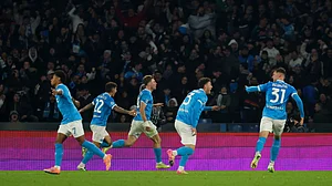 (Alessandro Garofalo/LaPresse via AP) : Napoli's Rasmus Hojlund, centre, celebrates after scoring his side's second goal during the Serie A soccer match between Napoli and Juventus, in Naples, Italy, Sunday, Dec. 7, 2025