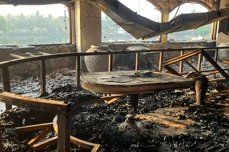 Charred remains at the nightclub where a fire broke out due to a cylinder blast, in North Goa district. At least 25 persons were killed and six others suffered injuries in the incident, according to officials. - | Photo: PTI