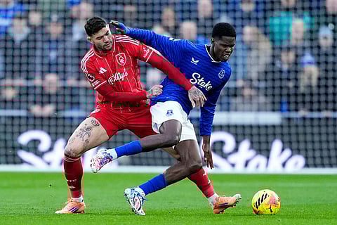 Nottingham Forest's Morato, left, and Everton's Thierno Barry in action during the English Premier League soccer match between Everton and Nottingham Forest in Liverpool, England.
