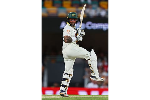 Australia's Jake Weatherald looks back after playing a shot during the second Ashes cricket test match between Australia and England in Brisbane.