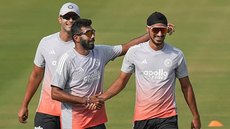 India's Jasprit Bumrah, center, Arshdeep Singh, right, and Shivam Dube during a practice session on the eve of the first T20 cricket match of a series between India and South Africa, at Barabati Stadium, in Cuttack, Odisha. - | Photo: PTI/Shailendra Bhojak