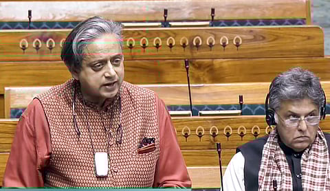 Congress MP Shashi Tharoor speaks in the Lok Sabha during the Winter session of Parliament, in New Delhi, Thursday, Dec. 4, 2025.

