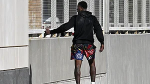 | Photo: AP/Phelan M. Ebenhack : File photo of Miami Heat guard Terry Rozier leaving the U.S. Federal Courthouse through a side door after his arraignment on October 23, 2025.