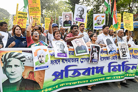 Congress activists participate in a protest march against the Rajya Sabha Secretariat's reminder to MPs of Parliamentary rules, which advised against raising slogans such as 'Vande Mataram' and 'Jai Hind' inside or outside Parliament to maintain decorum, in Kolkata.