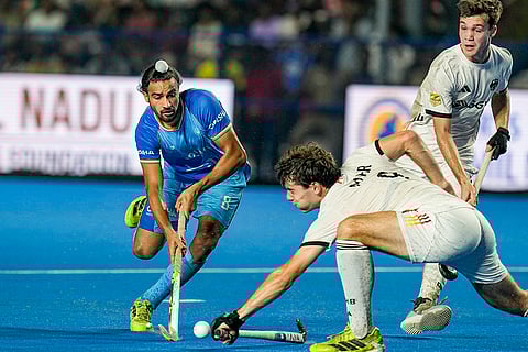 India's Manmeet Singh (8) and Germany's Nahr Quirin (9) vie for the ball during the semi-final match of the FIH Hockey Men’s Junior World Cup 2025, at Mayor Radhakrishnan Hockey Stadium in Chennai.