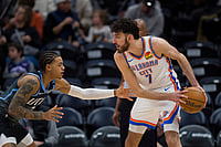 | Photo: AP/Bethany Baker : Oklahoma City Thunder center/forward Chet Holmgren (7) keeps the ball away from Utah Jazz guard Keyonte George (3) during the second half of an NBA basketball game in Salt Lake City.
