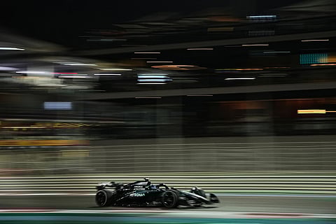 Mercedes driver George Russell of Britain steers his car during the Formula One Abu Dhabi Grand Prix at the Yas Marina Circuit in Abu Dhabi, UAE.