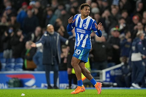 Brighton and Hove Albion's Georginio Rutter celebrates after scoring his sides first goal during the English Premier League soccer match between Brighton and Hove Albion v West Ham United, in Brighton, England.
