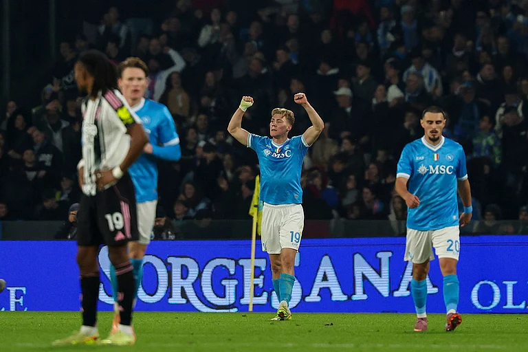Napoli's Rasmus Hojlund, centre, celebrates after scoring his side's second goal during the Serie A soccer match between Napoli and Juventus, in Naples, Italy. - | Photo: Alessandro Garofalo/LaPresse via AP