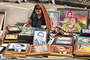 | Photo: Imago/Hindustan Times : The Icon: A young boy sells portraits
of Ambedkar