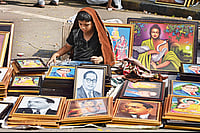 | Photo: Imago/Hindustan Times : The Icon: A young boy sells portraits 
of Ambedkar