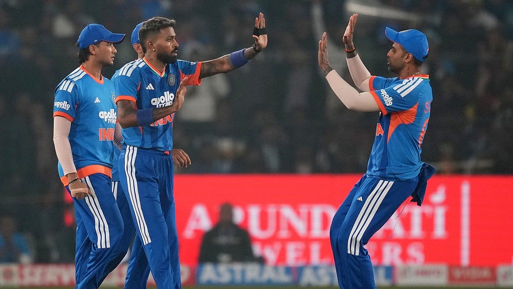 India's Hardik Pandya, centre, celebrates with teammates the wicket of South Africa's David Miller during the first T20I in Cuttack. - AP