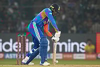 Photo: AP/Rafiq Maqbool : India's Abhishek Sharma plays a shot during the first T20 International cricket match between India and South Africa in Cuttack, India.
