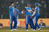 | Photo: AP/Rafiq Maqbool : India's captain Suryakumar Yadav, right, with teammates celebrates after winning the first T20 International cricket match between India and South Africa in Cuttack.