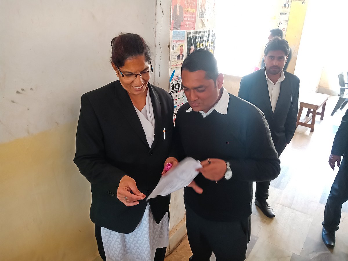 Indian woman lawyer checks documents in Supreme court - Imago