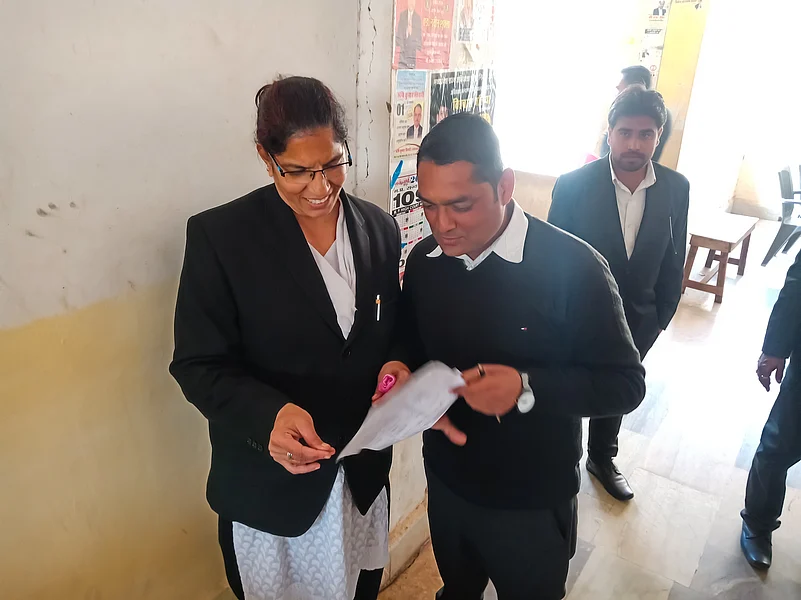 Indian woman lawyer checks documents in Supreme court