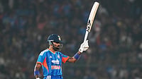AP Photo/Rafiq Maqbool : India's Hardik Pandya celebrates his fifty runs during the first T20 International cricket match between India and South Africa in Cuttack, India, Tuesday, Dec. 9, 2025.