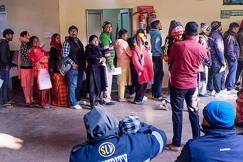 People wait in a queue at Civil Hospital on the second day of a strike by Haryana government hospitals' doctors, in Gurugram.