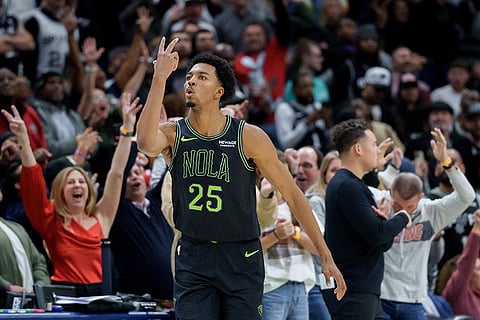 New Orleans Pelicans forward Trey Murphy III (25) reacts after a three point basket during the fourth quarter of an NBA basketball game against the San Antonio Spurs in New Orleans.