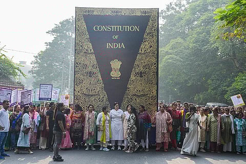 Members of Trinamool Mahila Congress participate in a protest march against the ongoing Special Intensive Revision (SIR) of electoral rolls, in Kolkata.