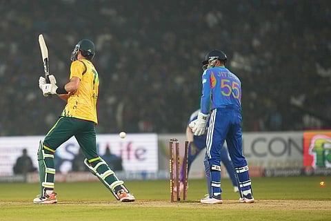South Africa's Marco Jansen bowled out by India's Varun Chakaravarthy during the first T20 International cricket match between India and South Africa in Cuttack.