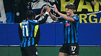 Atalanta's Charles De Ketelaere celebrates his winner with Ademola Lookman during the UEFA Champions League match against Chelsea.