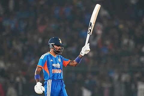 India's Hardik Pandya celebrates his fifty runs during the first T20 International cricket match between India and South Africa in Cuttack.