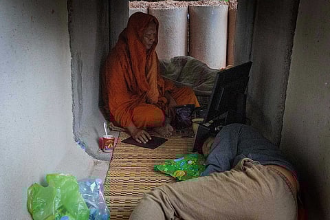 Thai residents, who fled clashes between Thai and Cambodian soldiers, takes shelter in Buriram province, Thailand.