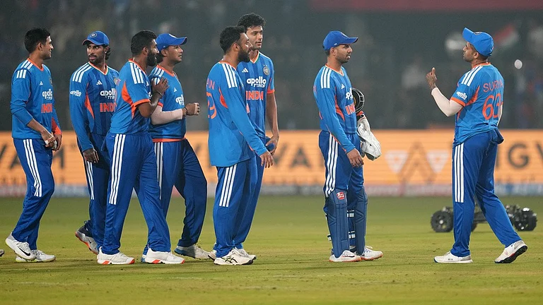 India's captain Suryakumar Yadav, right, with teammates celebrates after winning the first T20I against South Africa in Cuttack. - AP