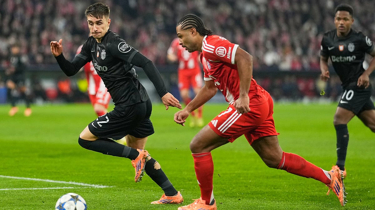 Bayern Munich's Serge Gnabry challenges for the ball with Sporting CP's Ivan Fresneda during their UEFA Champions League opening phase match on December 9, 2025. - | Photo: AP/Matthias Schrader