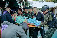 Thailand-Cambodia Border Dispute: Death Toll Rises To At Least 48 | Photo: Royal Thai Army via AP : In this photo released by Royal Thai Army, a wounded Thai soldier is carried to be transferred to a hospital in Sisaket province, Thailand after, according to a Thai army spokesperson, Cambodian troops fired into Thai territory.