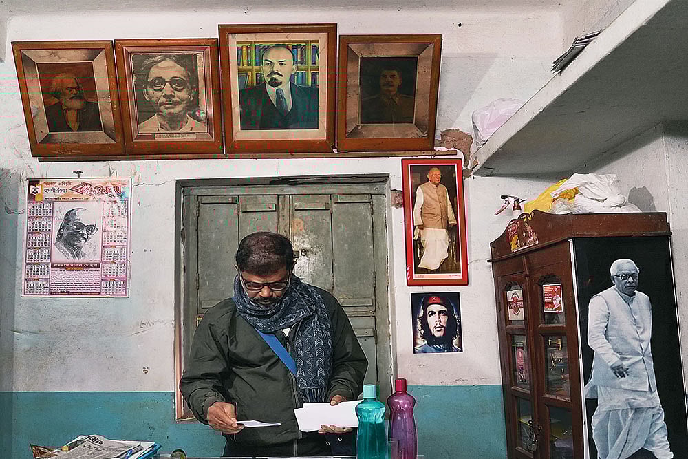 The Old-world Charm: A CPI(M) comrade working at the party’s office in Kamarpurkar in Hoogly district of West Bengal  - | Photo: Sandipan Chatterjee