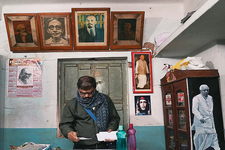 The Old-world Charm: A CPI(M) comrade working at the party’s office in Kamarpurkar in Hoogly district of West Bengal - | Photo: Sandipan Chatterjee