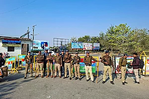 | Photo: PTI : Police personnel patrol the Banbhoolpura area ahead of the Supreme Court order in the railway land encroachment case, in Haldwani, Uttarakhand.