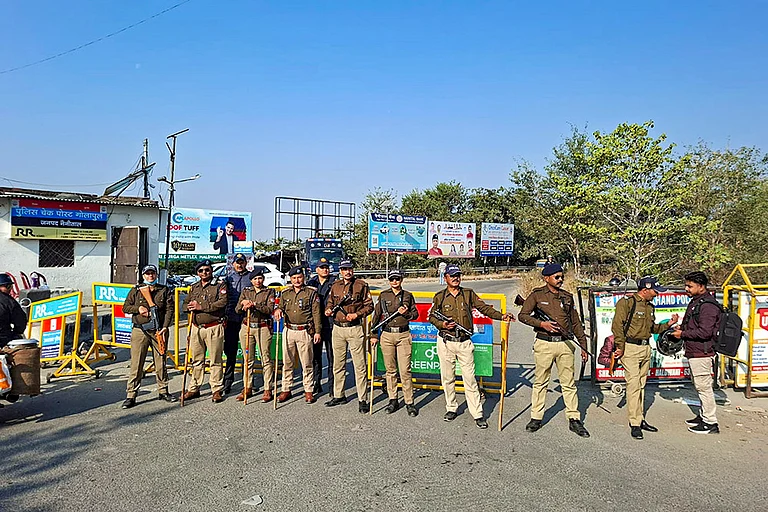 Police personnel patrol the Banbhoolpura area ahead of the Supreme Court order in the railway land encroachment case, in Haldwani, Uttarakhand. - | Photo: PTI