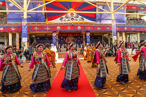 Artists perform during an event marking Dalai Lama’s 36th anniversary of the Nobel Peace Prize, in Dharamshala, Himachal Pradesh.