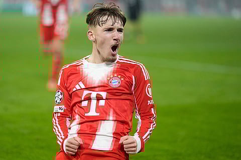 Bayern's Lennart Karl celebrates after scoring his side's second goal during the Champions League opening phase soccer match between FC Bayern Munich and Sporting CP in Munich, Germany.