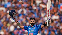 | Photo: PTI/Kunal Patil : India's Virat Kohli celebrates his century during the second ODI cricket match of a series between India and South Africa, at Shaheed Veer Narayan Singh International Stadium, in Raipur, Chhattisgarh.