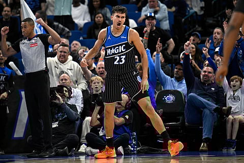 Orlando Magic forward Tristan da Silva (23) celebrates after scoring during the first half of an NBA Cup basketball game against the Miami Heat in Orlando, Florida. 