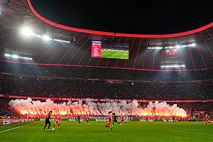 | Photo: AP/Matthias Schrader : Fans light flares during the Champions League opening phase soccer match between FC Bayern Munich and Sporting CP in Munich, Germany.