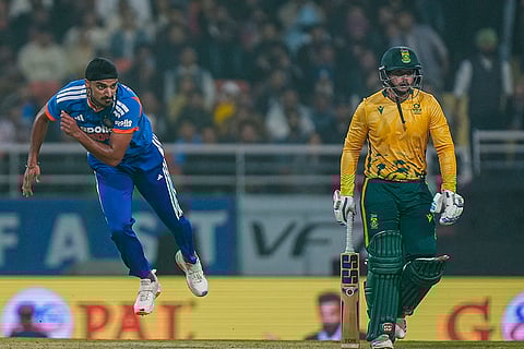 India's Arshdeep Singh bowls a delivery during the second T20 International cricket match of a series between India and South Africa, at Maharaja Yadavindra Singh International Cricket Stadium, in New Chandigarh.